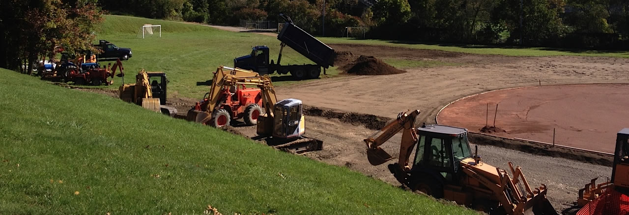 Excavating equipment on job site